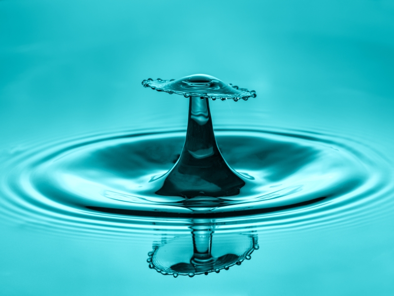 water-drop-collision-with-abstract-blue-effect